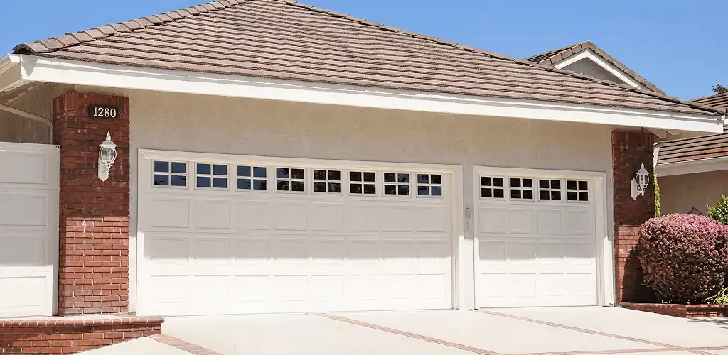 Residential garage door repair service for a double garage door in Naperville, IL