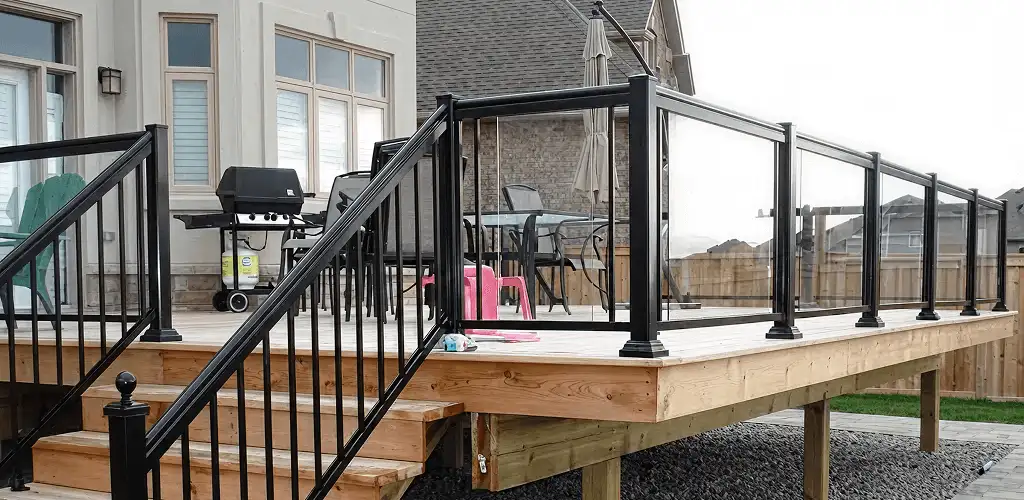 Handrail installation on a deck staircase for safety and code compliance in Naperville, IL